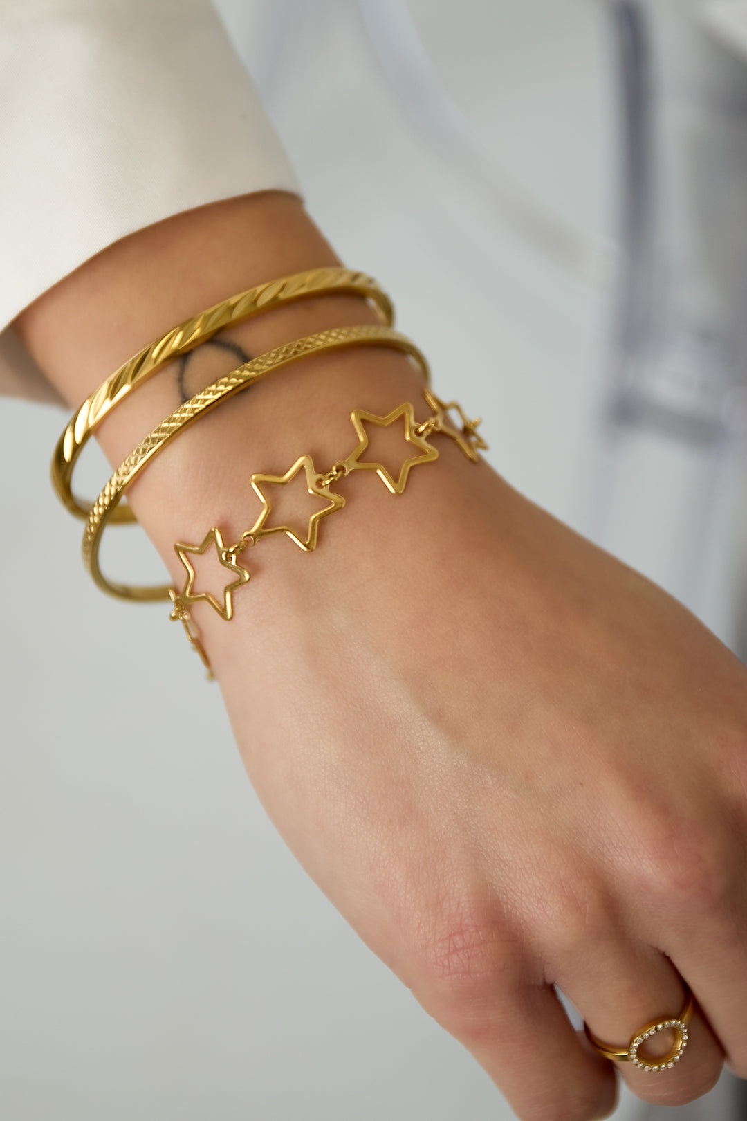 Goud Aurora Star Armband RVS – Goud – detail close-up | Tudor Gems
