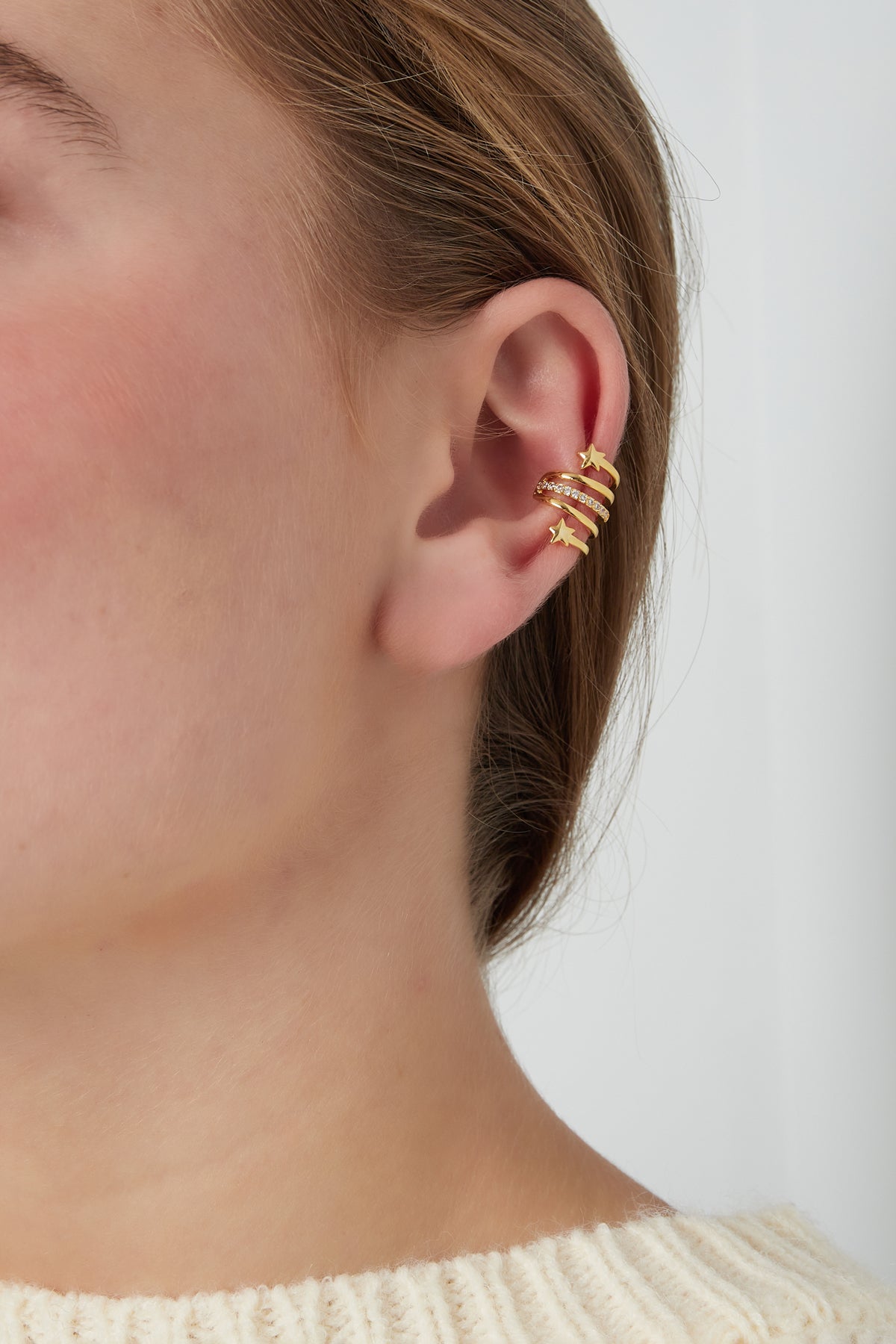 Goud & Zilver Starlight Twirl Earcuff RVS Goud – detail close-up | Tudor Gems