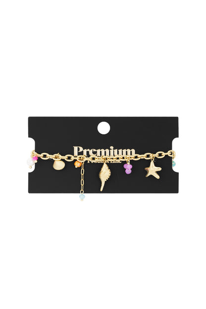 Goud & Zilver Boho Bedelarmband met Schelp & Zeepaardje – Goud & Zilver RVS – lifestyle shot | Tudor Gems